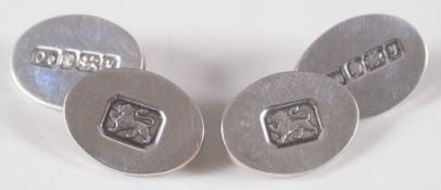 A pair of silver oval,  'hallmark' cuff-links:, approximately 15gms gross weight,