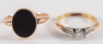 An 18ct gold and platinum diamond set ring:, the circular,