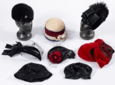 Two polystyrene hat mannequins, eight lady's fashion hats and a group of cardboard hat boxes:.