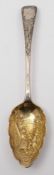 A George III silver gilt serving spoon, maker John Hawkins, London, 1802:,