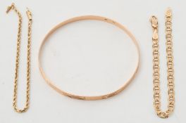 A rope-twist bracelet stamped '14K',