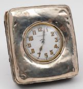 A travelling timepiece, contained in a silver travelling case, marks illegible: with 5.5cm.