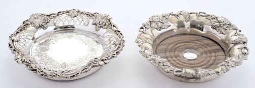 A plated wine coaster: of circular form with pierced border decorated with grapes and vine leaves,