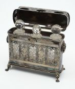 An ep three decanter tantalus: of rectangular outline with three matched tantalus and stoppers,