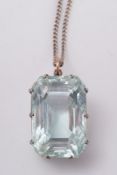 A large rectangular aquamarine single stone pendant:,