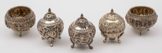 A set of three Indian silver pepperettes: of globular form,