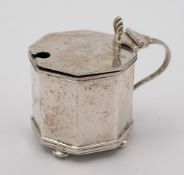 A George V silver mustard pot, maker Rotherham & Sons, Birmingham, 1912:, of octagonal outline,
