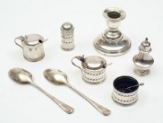 Six silver cruet items, various makers and dates: together with a silver candlestick and spoons.