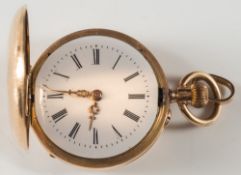 A lady's 14ct gold cased fob watch: with engine turned decoration.