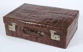 A crocodile skin suitcase, 50 x 33cm:.