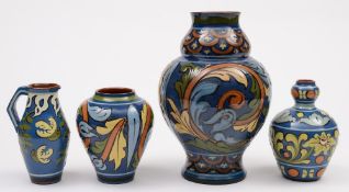 Three Aller Vale (Torquay) pottery vases and a small jug: comprising an ogee shaped example,