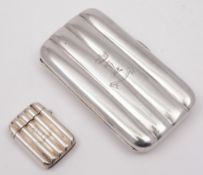 A Victorian silver cigar case, maker George Unite, London, 1889: monogrammed, 12.5cm.