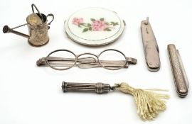 A pair of George III silver spectacles:, lenses lacking, two silver pocket knives,