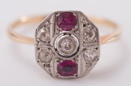 A gold, ruby and diamond hexagonal cluster ring:, ring size P 1/2.