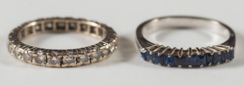 A diamond eternity ring with circular,