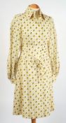 A Christian Dior 'Diorling' cream, green and yellow pattern dress,