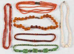 Six various bead necklaces to include a coral three strand necklace,