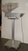 Gemel Preceision tablet deduster with dual dust collection ports, plexiglas hopper with
lid,