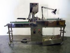 2000 KD1-1 belt inspection system for tablets. Dual variable speed belts allow tablets to be flipped