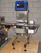 Mettler Hi Speed Model RX-2 Check Weigher, set at 100 Gram Capacity for up
to 300 parts per