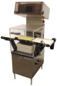 Garvens SL-3PM-CT hi speed check weigher with a maximum
capacity weigh range of 0 to 700 grams.
