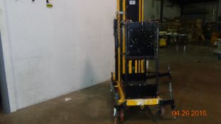 Wil-Lift one-man electric lift with on board battery charger on caster with adjustable outriggers