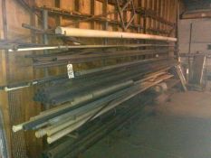 Aprox. 35 Pcs.  PVC Pipe on Rack on Wall