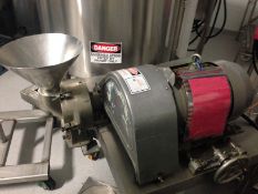 Fitzmill Reducer, Model ______, S/N ______, with 4 HP Motor, Mounted on Table with Casters (LO
