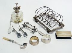 A pair of octagonal napkin rings, engine