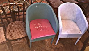 Two Lloyd Loom style chairs and a cane s