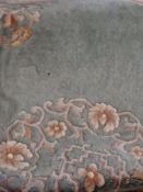 Chinese washed wool rug, circular in sha