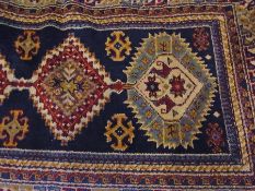 Persian style wool rug decorated with cr