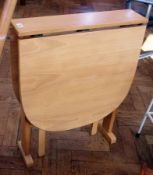 A modern beech drop flap occasional tabl