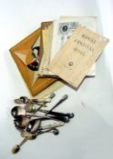 A small collection of flatware, a collec