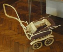 Mid 20th century Silver Cross doll's pus