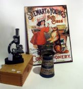 A quantity of costume jewellery, a Cadbu