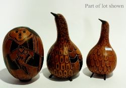 A quantity of carved wooden items includ