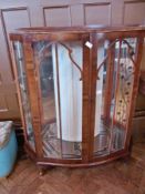 A Lloyd Loom style ottoman with upholste