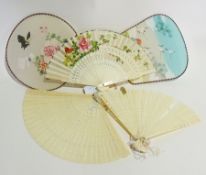 A folding ivory fan with pierced sticks