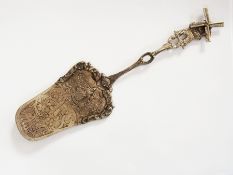 A continental white metal cake slice wit