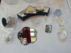 A quantity of glass, on display stand an