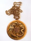Chinese gold-coloured disc pendant embos