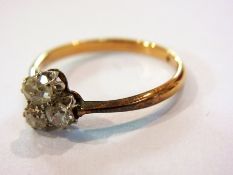 Gold-coloured metal, marked 18, three-st