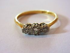 18ct gold and three-stone diamond ring,