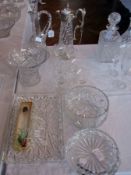 Two cut glass claret decanters, another