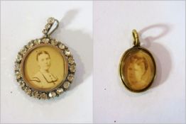 Silver locket surrounded by white stones