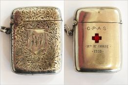 A silver vesta case inlaid with enamel r