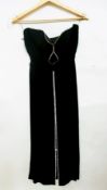 A black crepe evening dress, strapless,