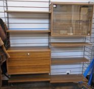 Mid 20th century Ladderax style shelf unit, teak effect with wire metalwork frame and shelves