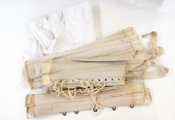 A Victorian cotton nightdress trimmed wi